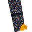 A dog training mat with a colorful polka dot pattern on a navy blue background, featuring a black strap and a yellow plush toy lure, displayed on top of stacked BLACKDOG boxes.